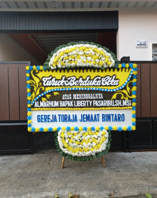 Papan Bunga Duka di Kibing